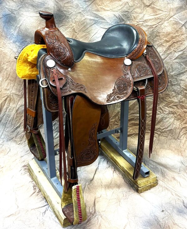 17 inch padded seat Balanced Ride Design for stability 3 1/2 inch cantle with 2 inch Cheyenne roll #4 roping horn for strength and control 5 inch deep roper stirrups for comfort and support